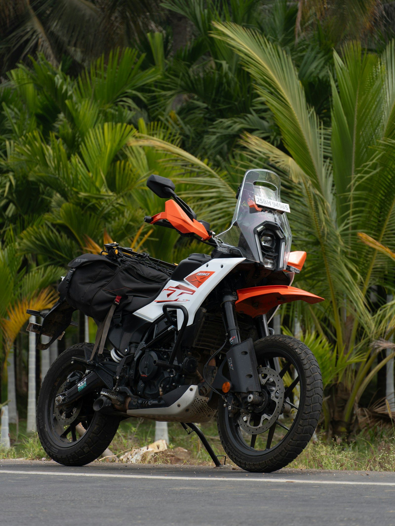 Adventure motorcycle parked on a jungle road